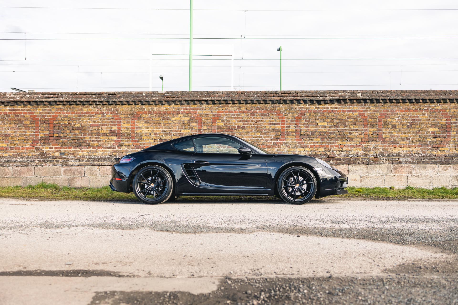 black-cayman-718-side-profile